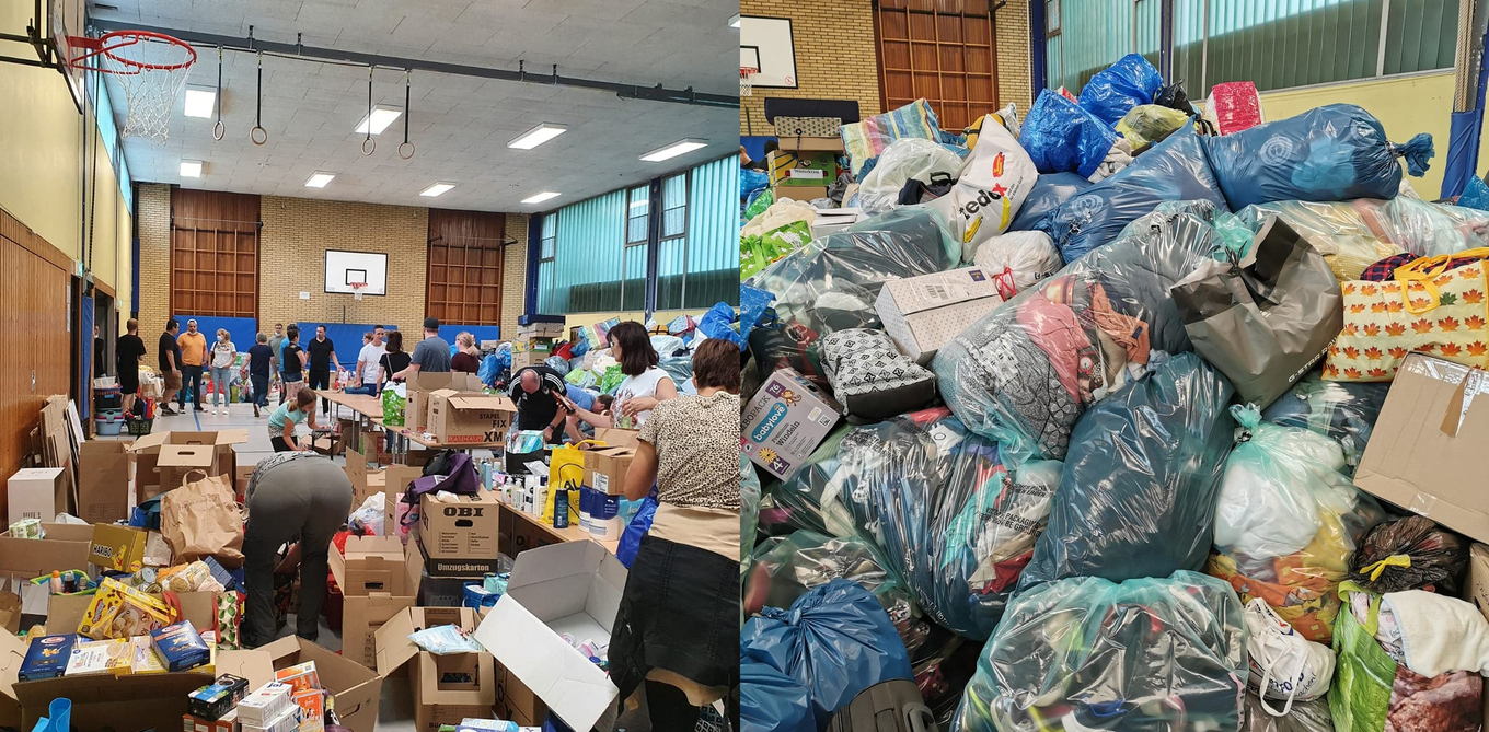 Tüten und Pakete voller Sachspenden in einer Turnhalle